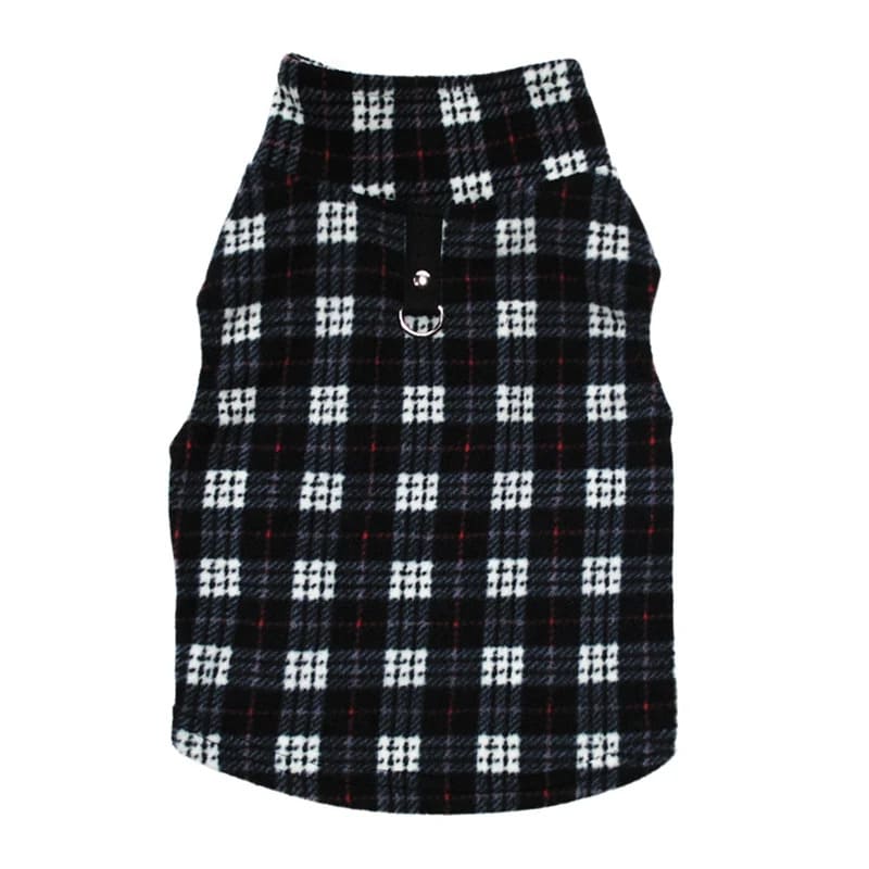 A black and white plaid winter dog vest displayed against a plain background. The vest has a classic tartan pattern with a simple front closure, and a small D-ring for leash attachment near the neckline.