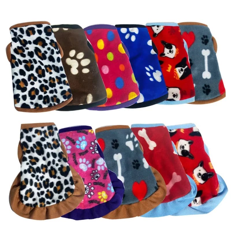 A selection of fleece jackets for pooches in various prints including leopard spots, polka dots, and paw patterns, suitable for keeping pets warm.